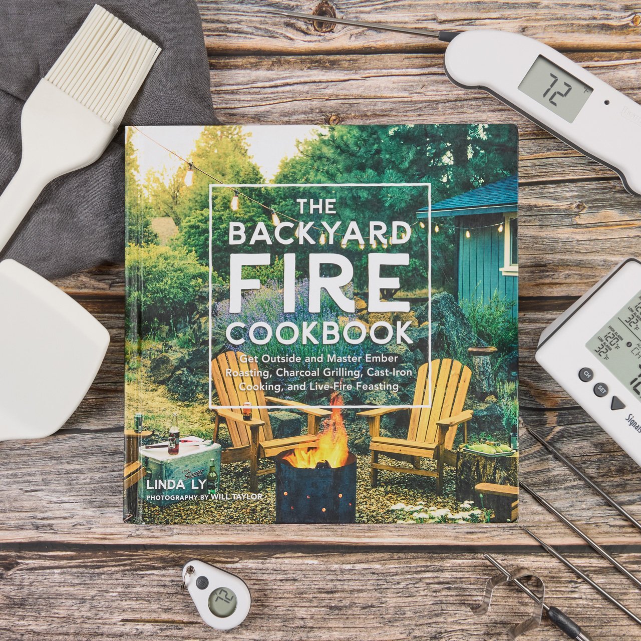 The Backyard Fire Cookbook: Get Outside and Master Ember Roasting, Charcoal Grilling, Cast-Iron Cooking, and Live-Fire Feasting (Great Outdoor Cooking) by Linda Ly